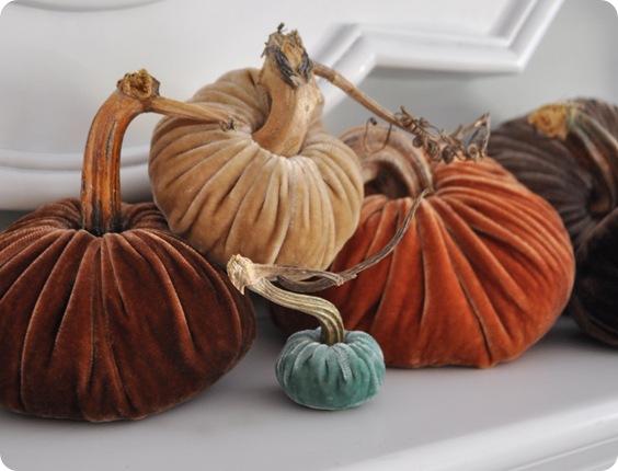 plush pumkins on mantel