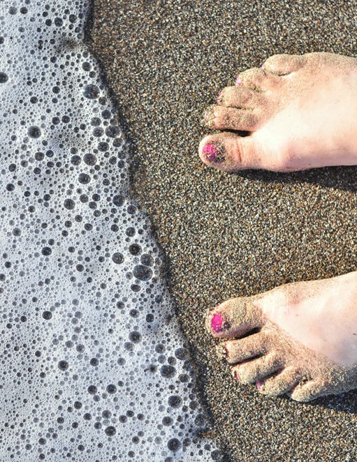 toes in beach sand