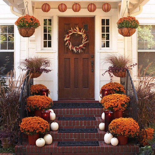 mums on porch bhg