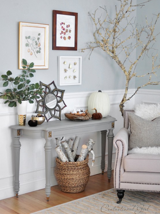 gray console with leaf prints