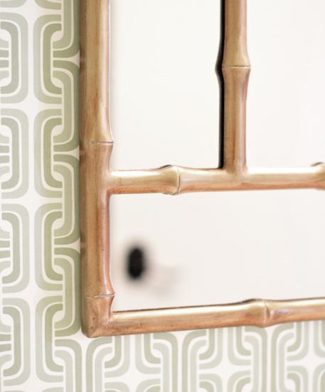 gold mirror and wallpaper